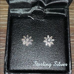 Diamond flower stud earring in sterling silver